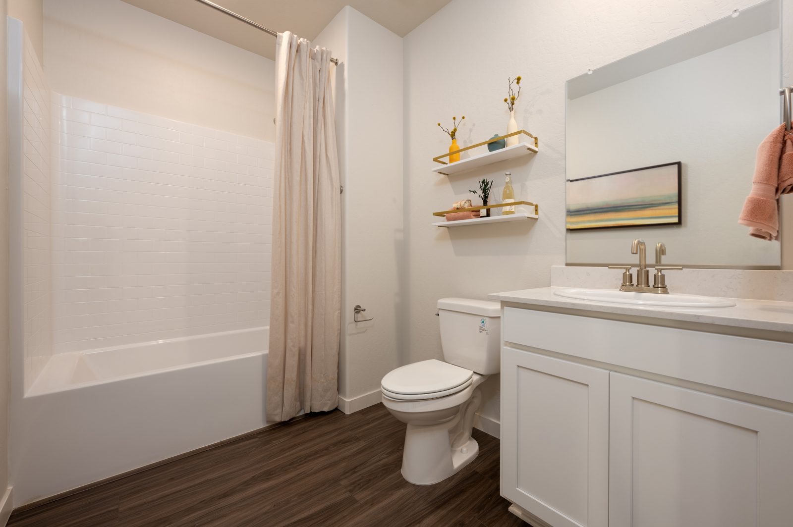 A bathroom with a toilet and sink.