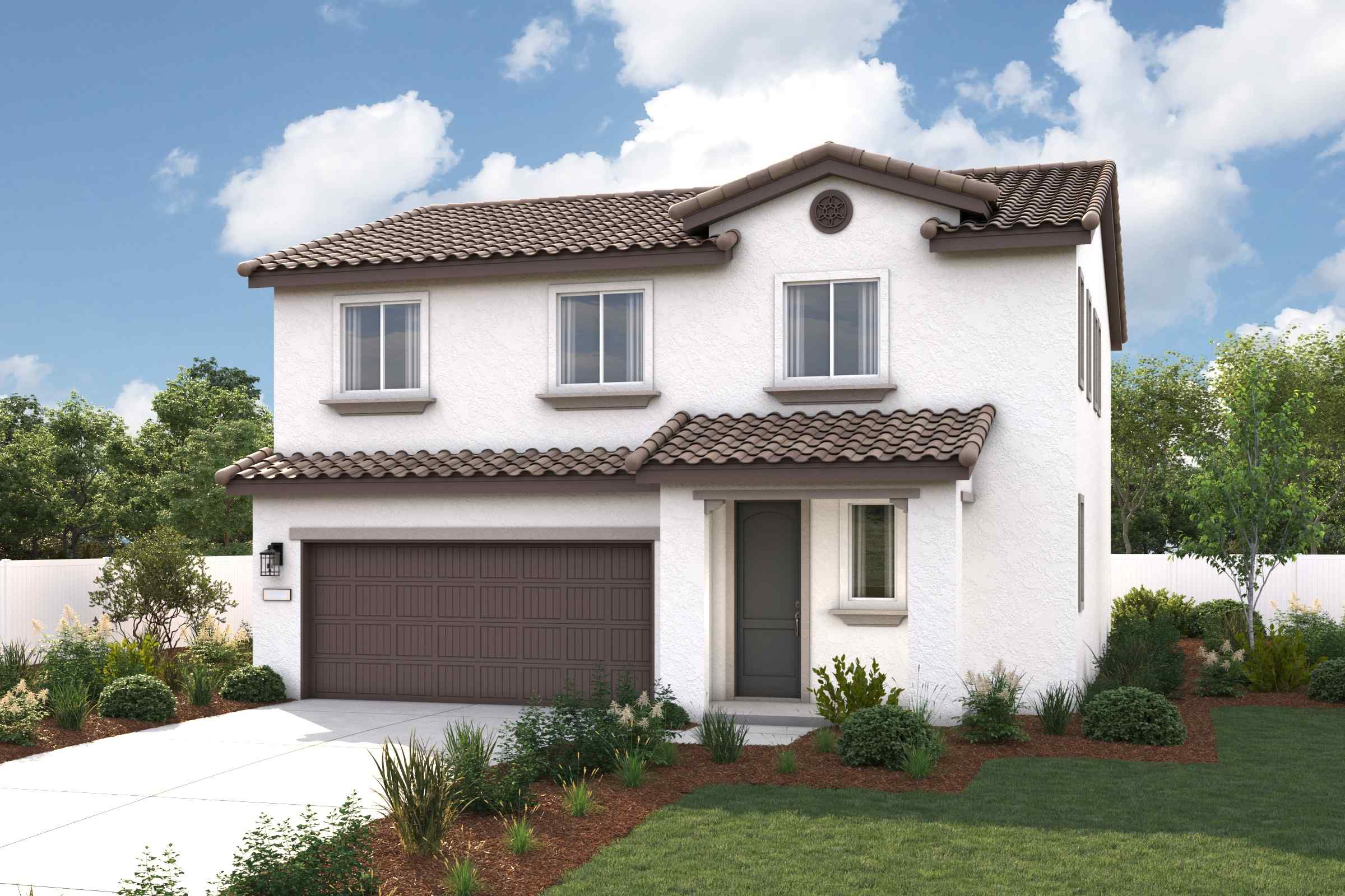 A white house with a garage.