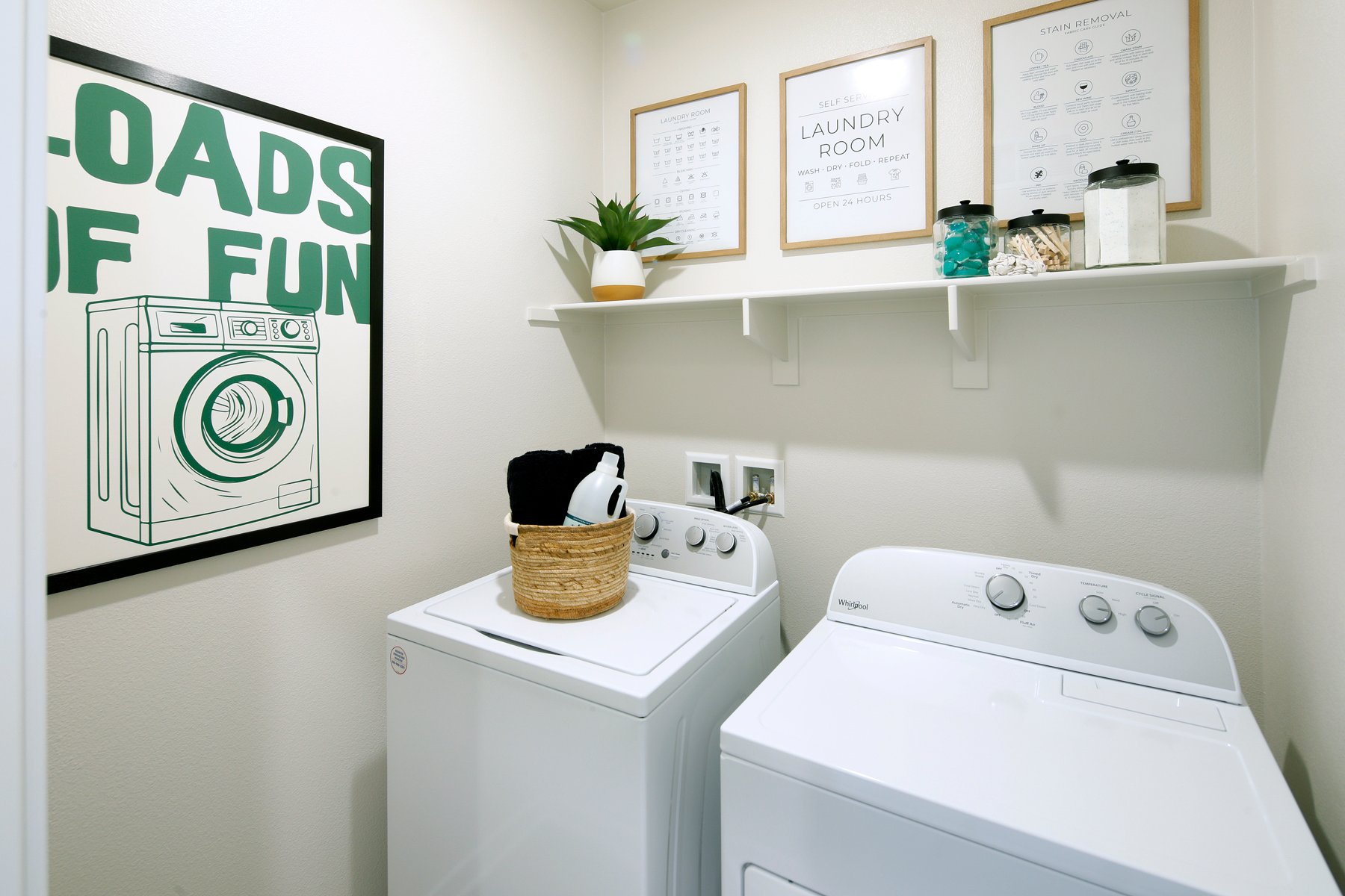 A laundry room with a washer and dryer.