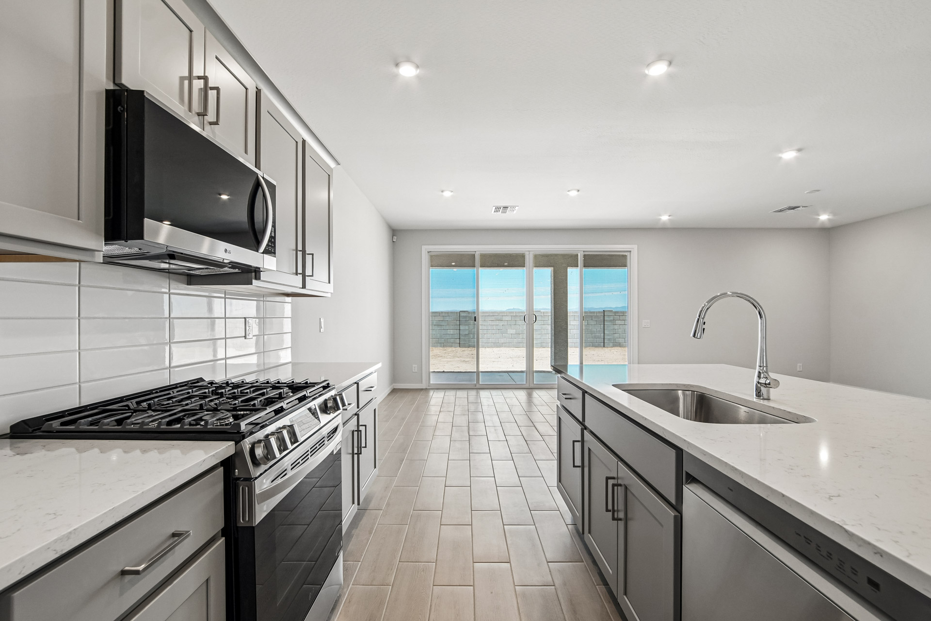 A kitchen with a tile floor.
