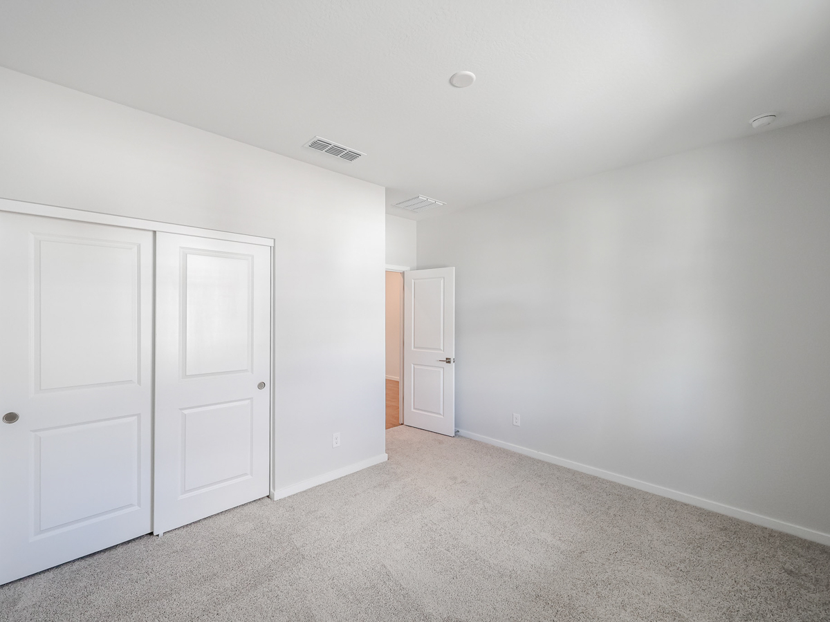 A room with white doors.