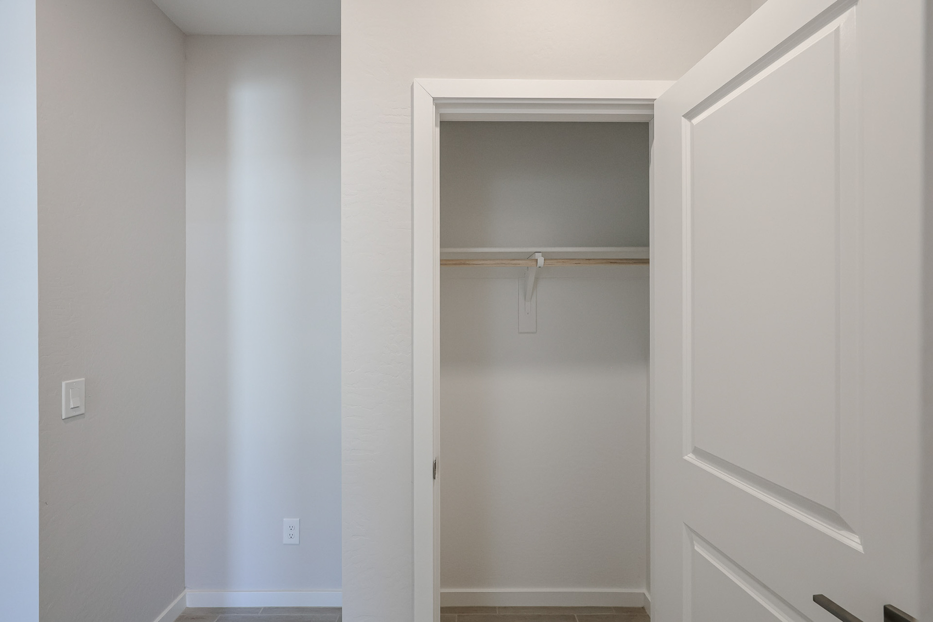 A white door with a glass window.