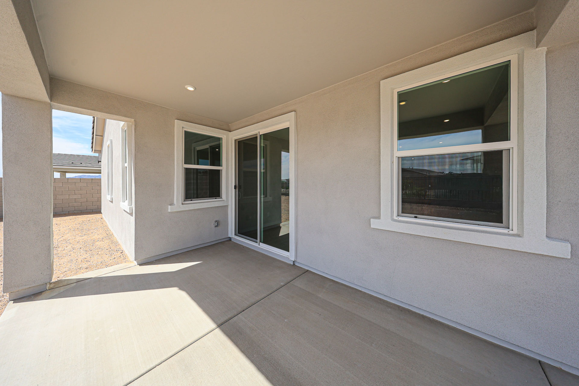 A room with windows and a door.