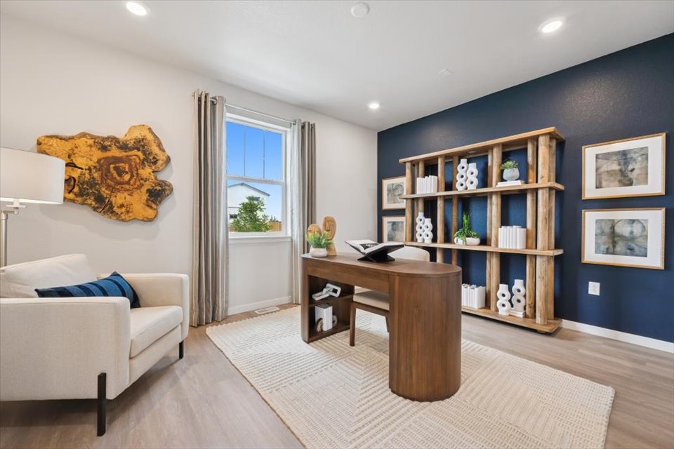 A living room with a table and a couch.