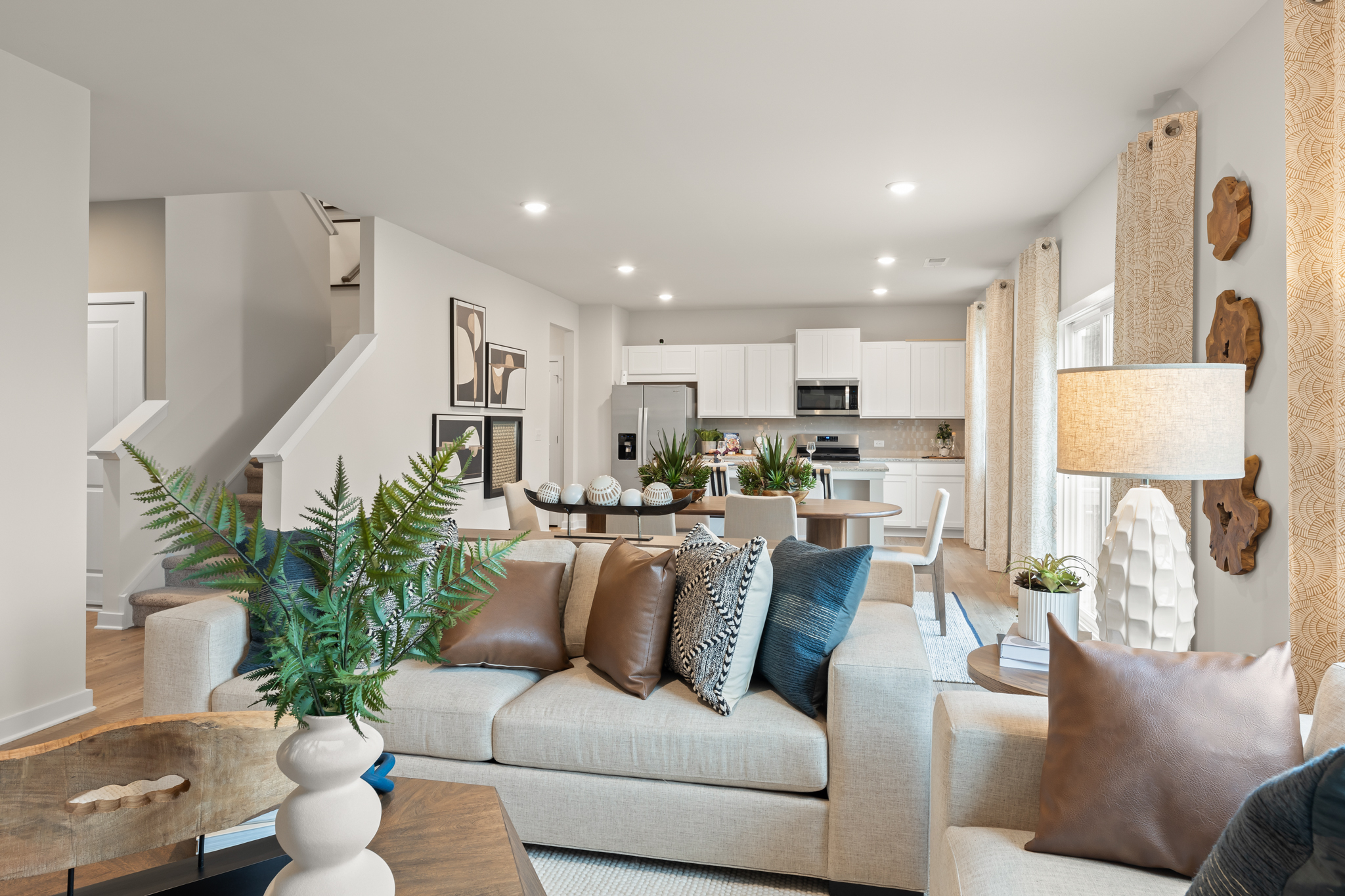 A living room with a couch and a table.