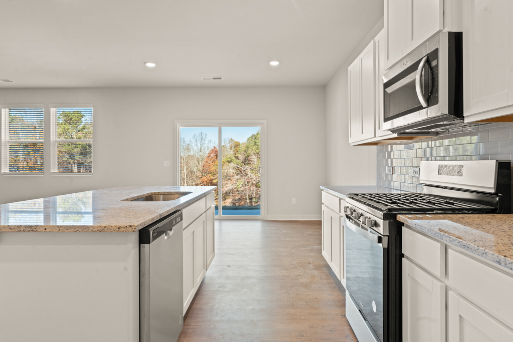 A kitchen with a large island.