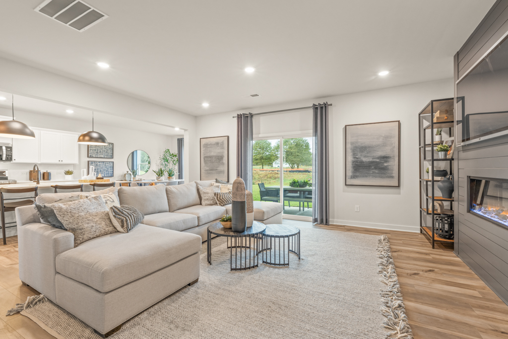 A living room with a large window.