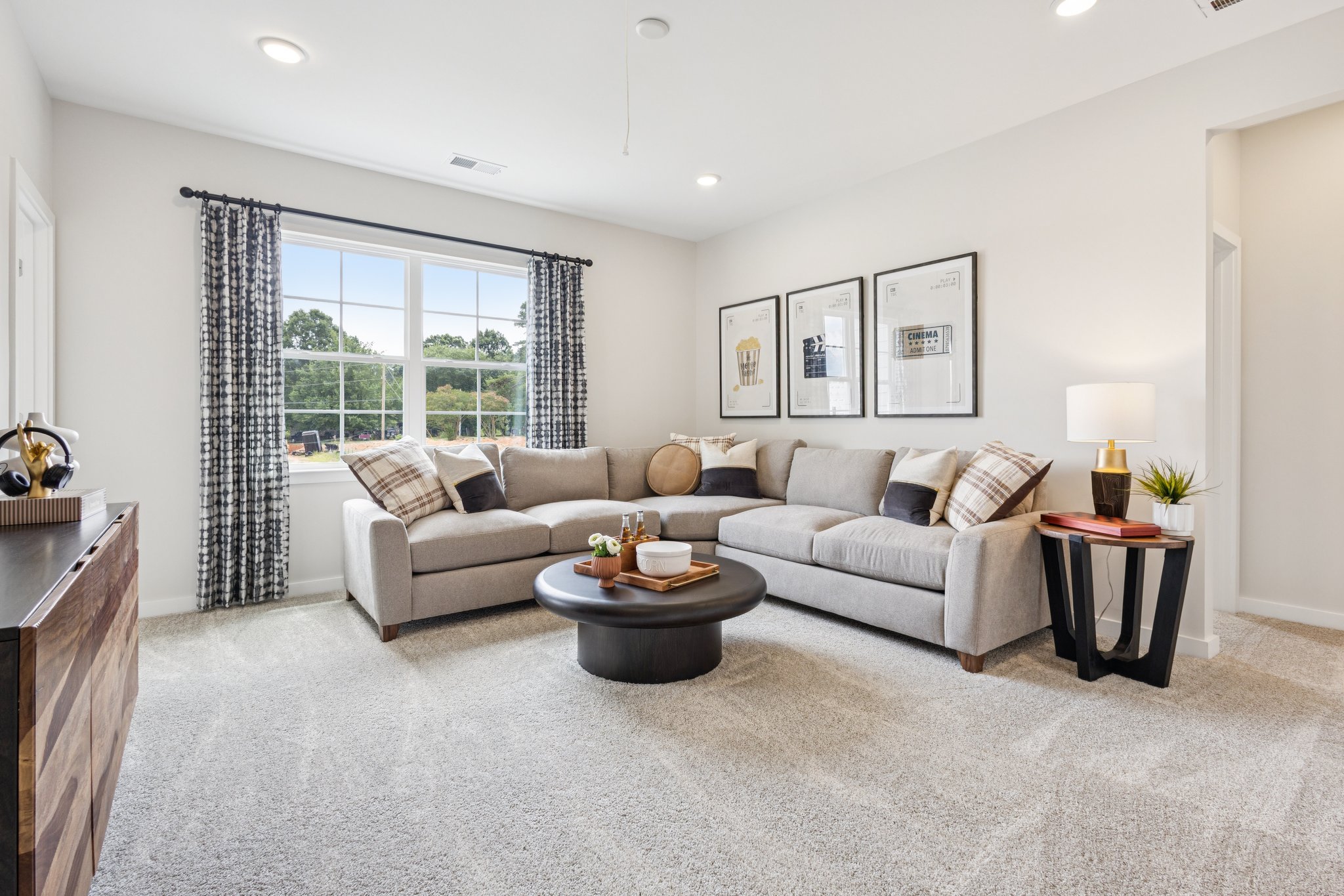 A living room with a couch and a coffee table.