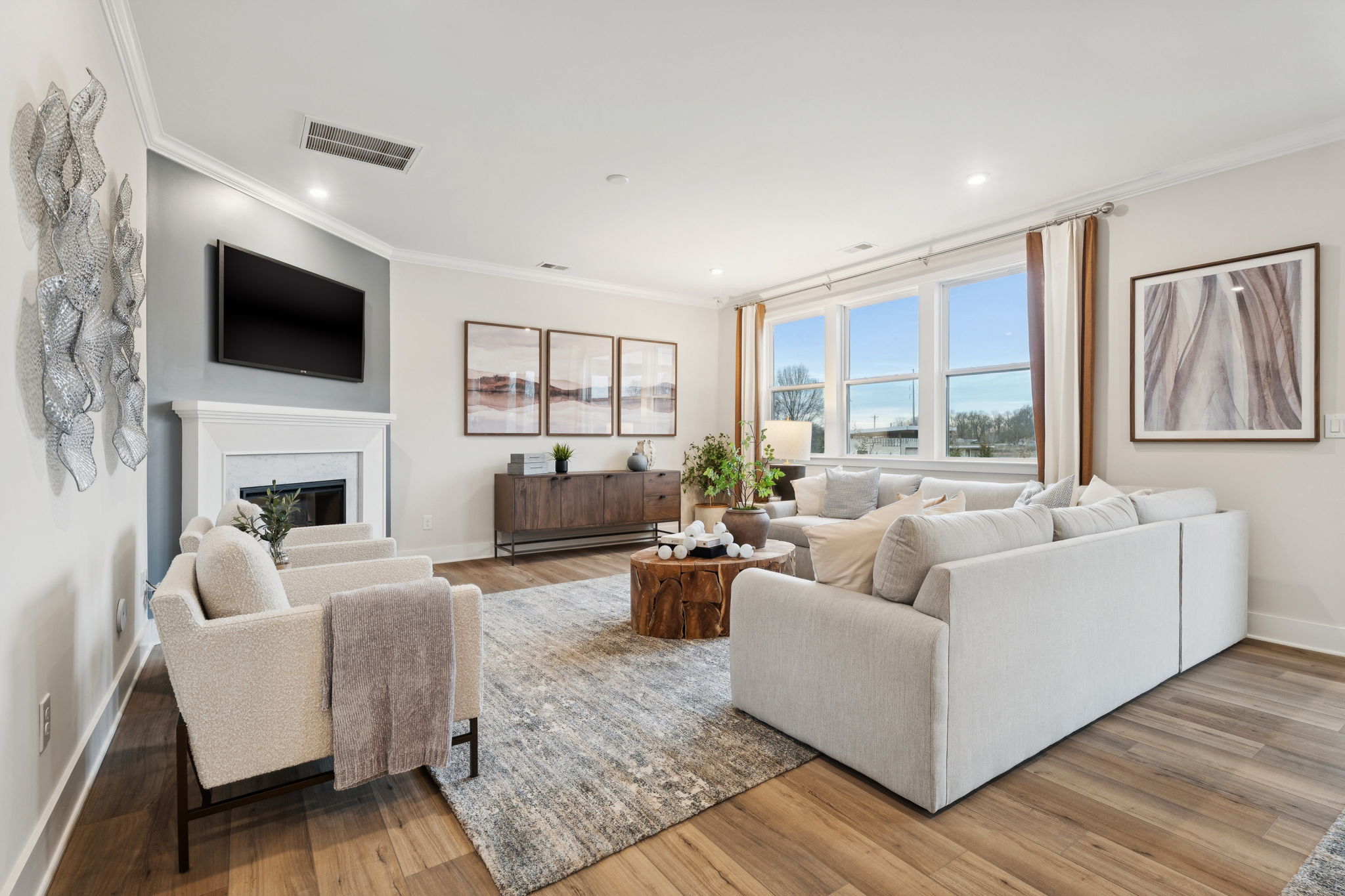 A living room with a fireplace.