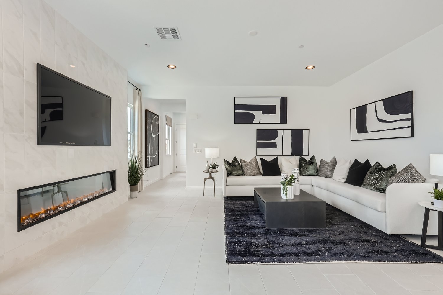 A living room with a fireplace.