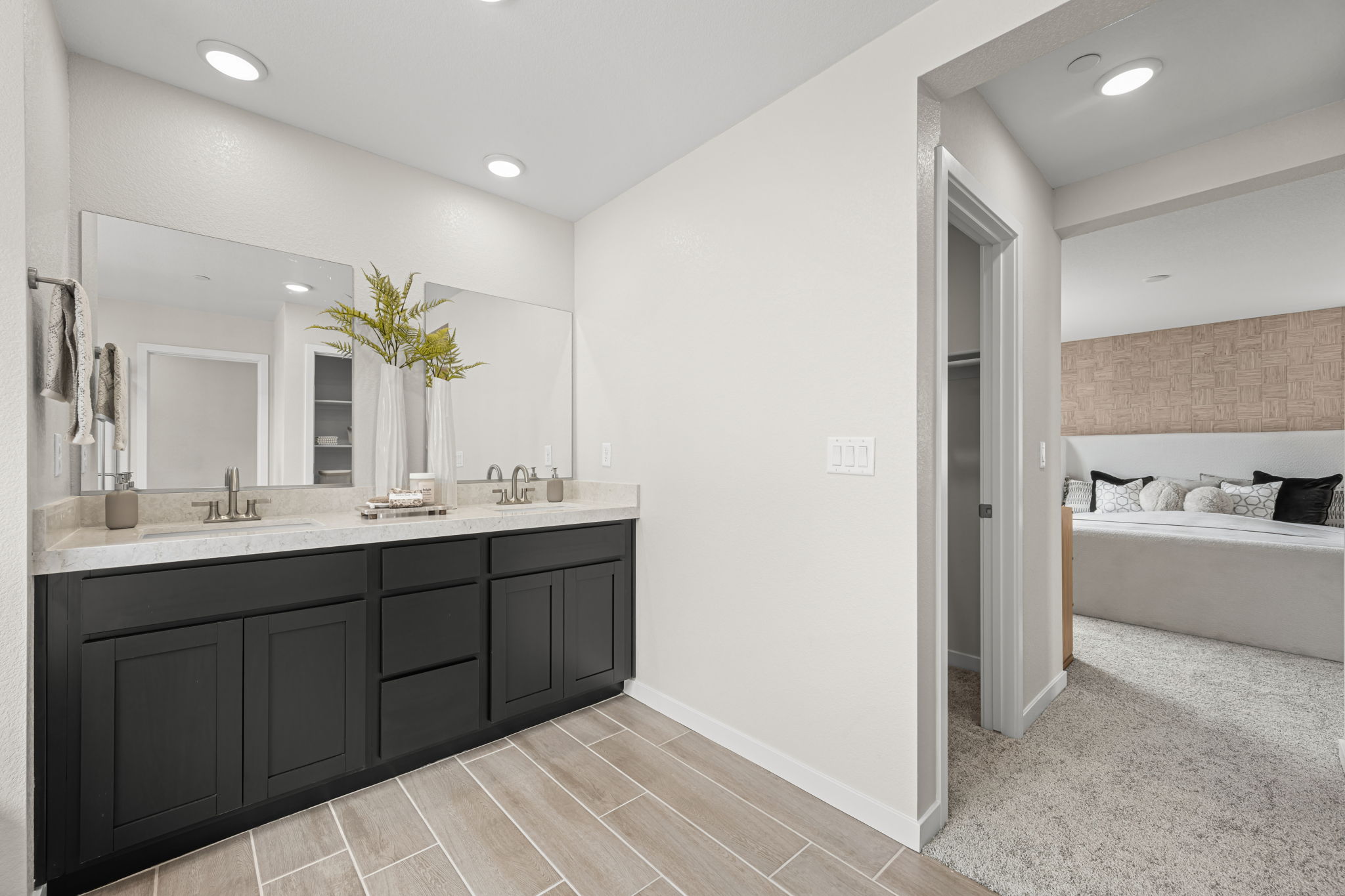 A bathroom with a tub sink and a bathtub.