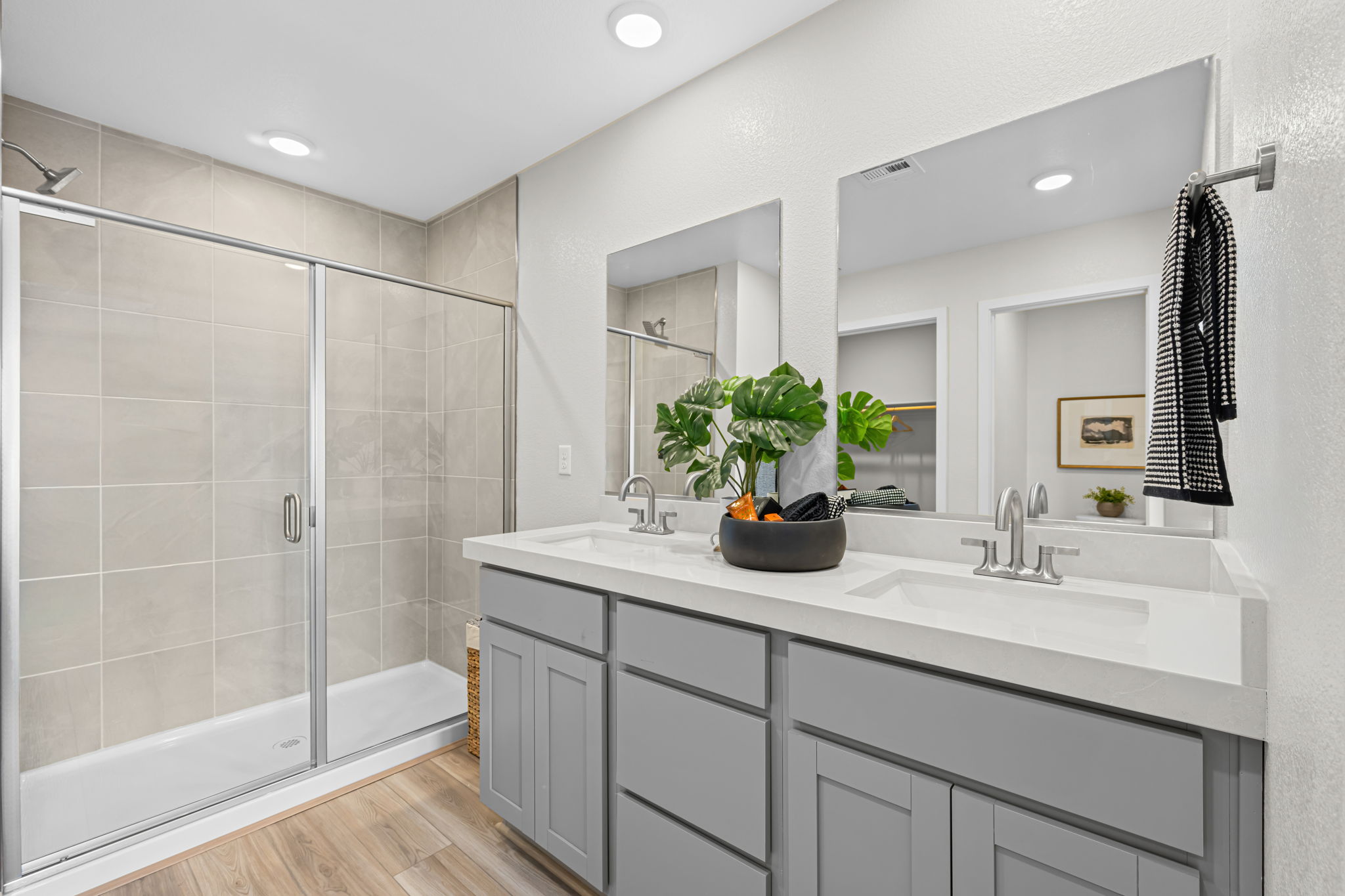A bathroom with a glass shower.