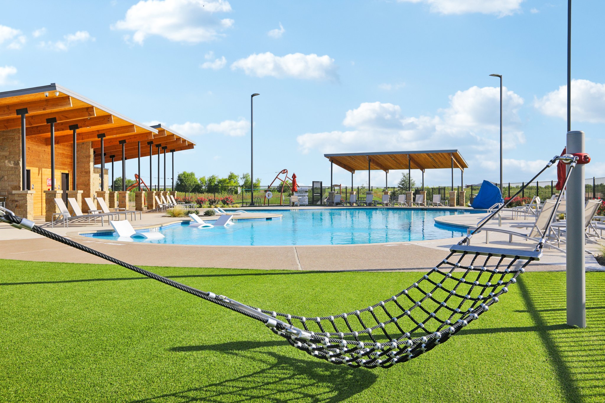 A swimming pool with a slide.