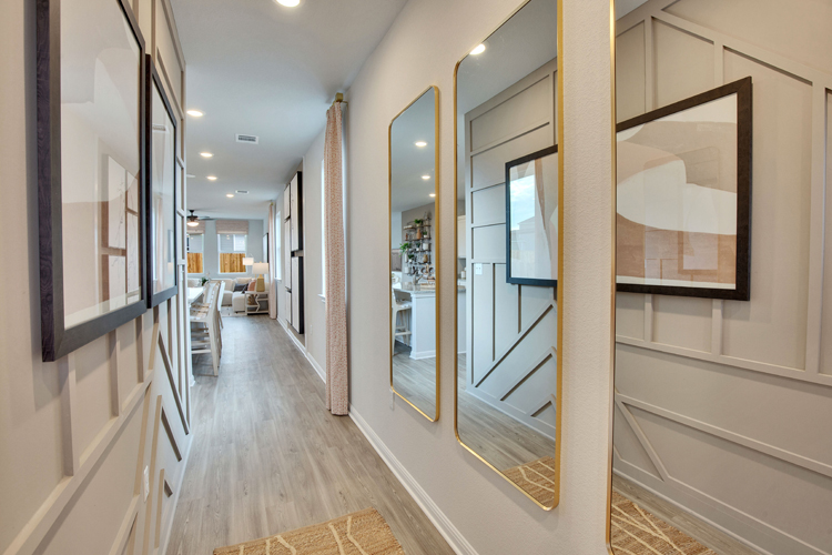 A hallway with a glass wall.