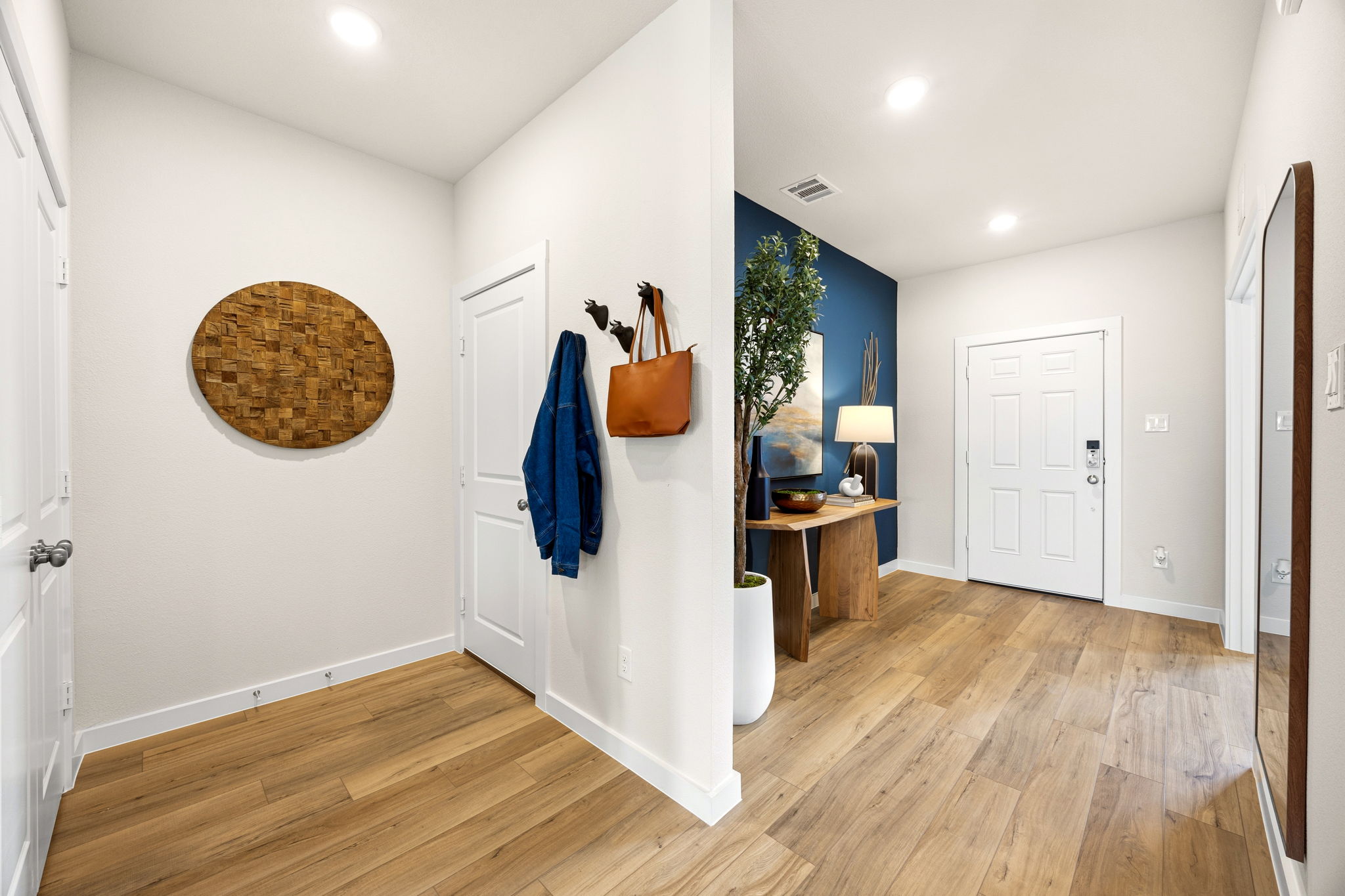 A room with a wood floor and a wood floor with a wood floor.