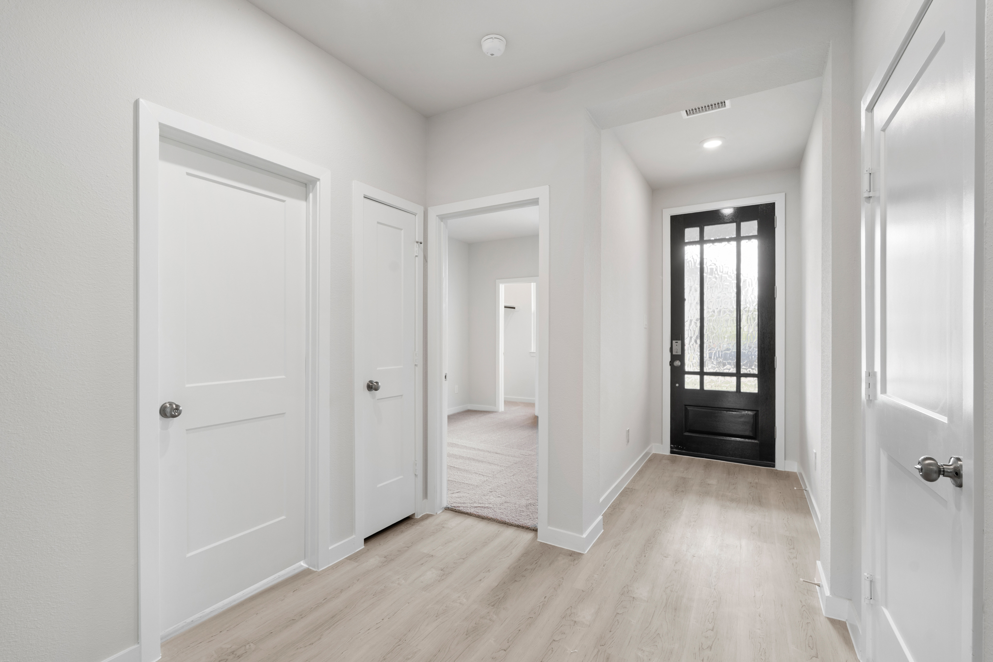 A room with white doors.