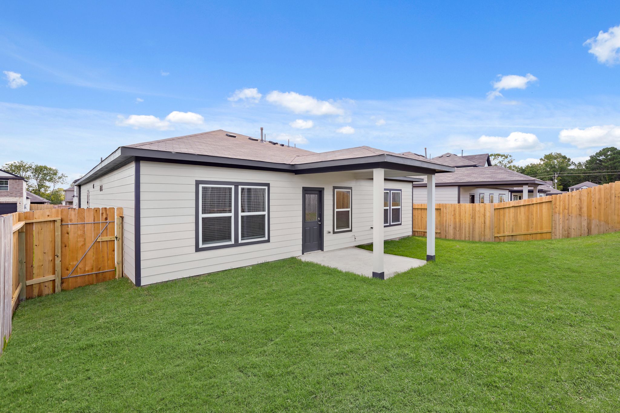 A house with a fence around it.