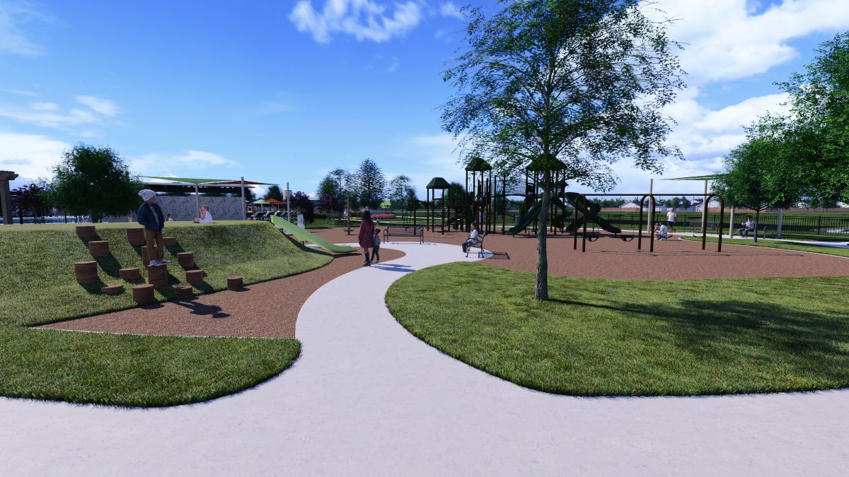 A group of people playing in a park.