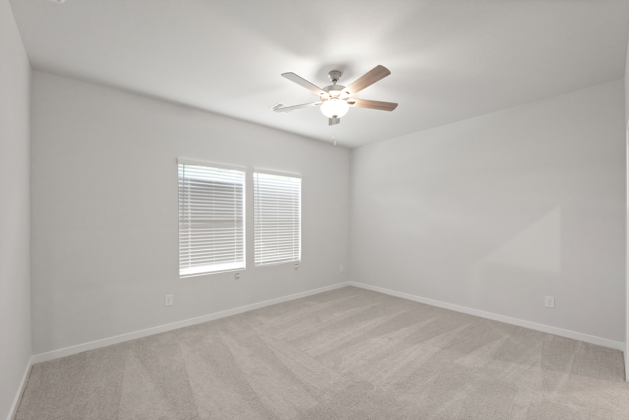 A ceiling fan in a room.