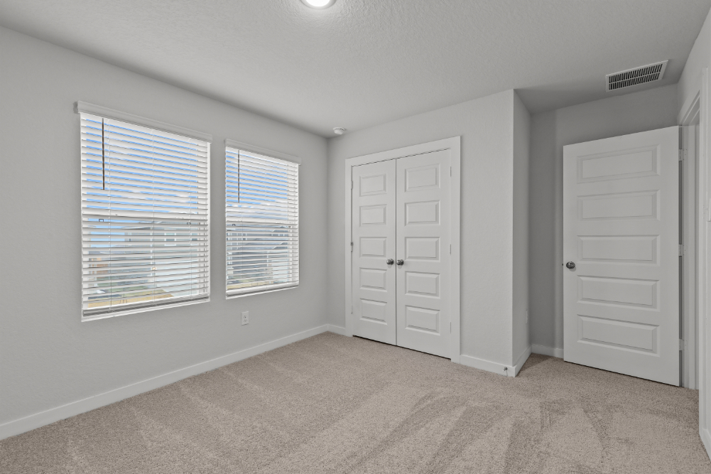 A room with white doors.