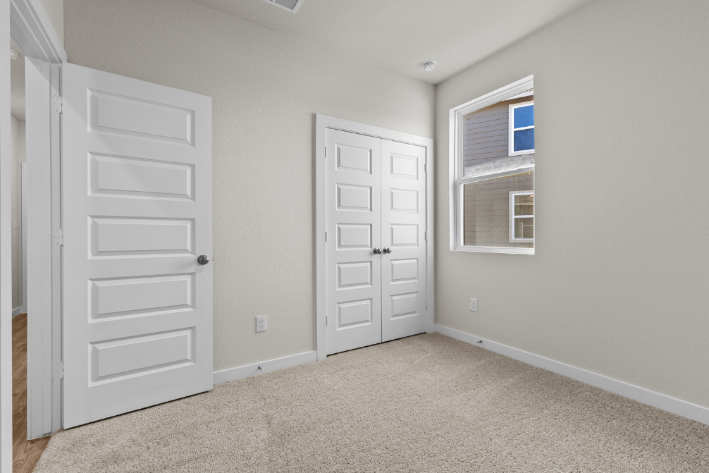 A room with white doors.