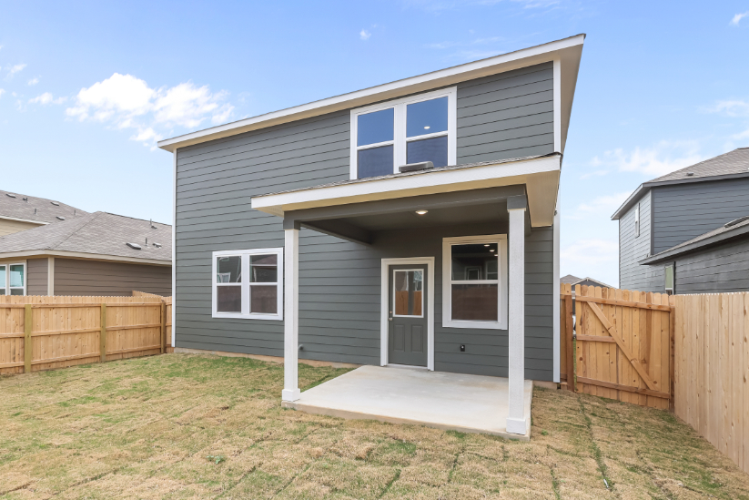 A house with a fence around it.