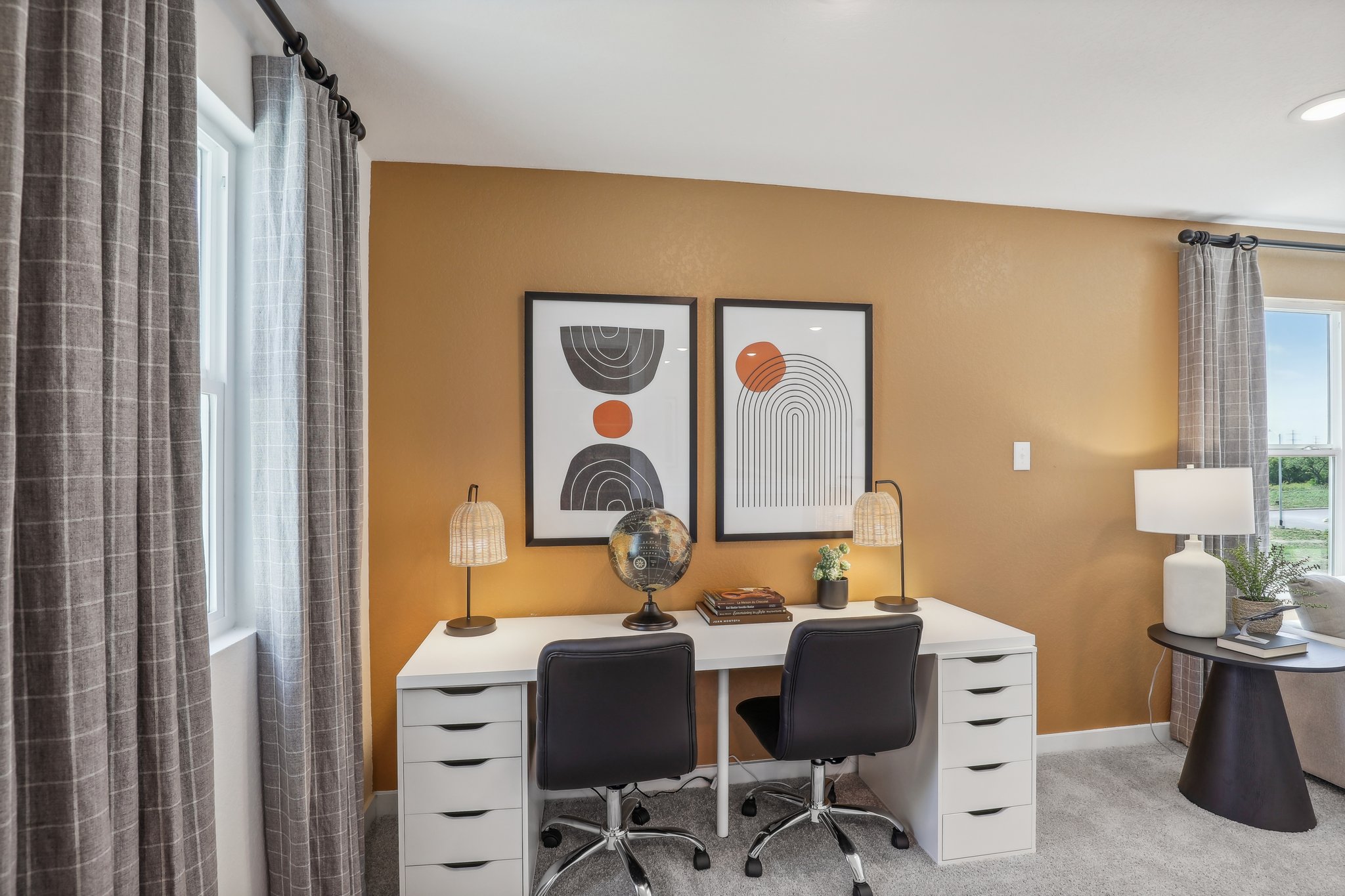 A room with a desk and a chair.