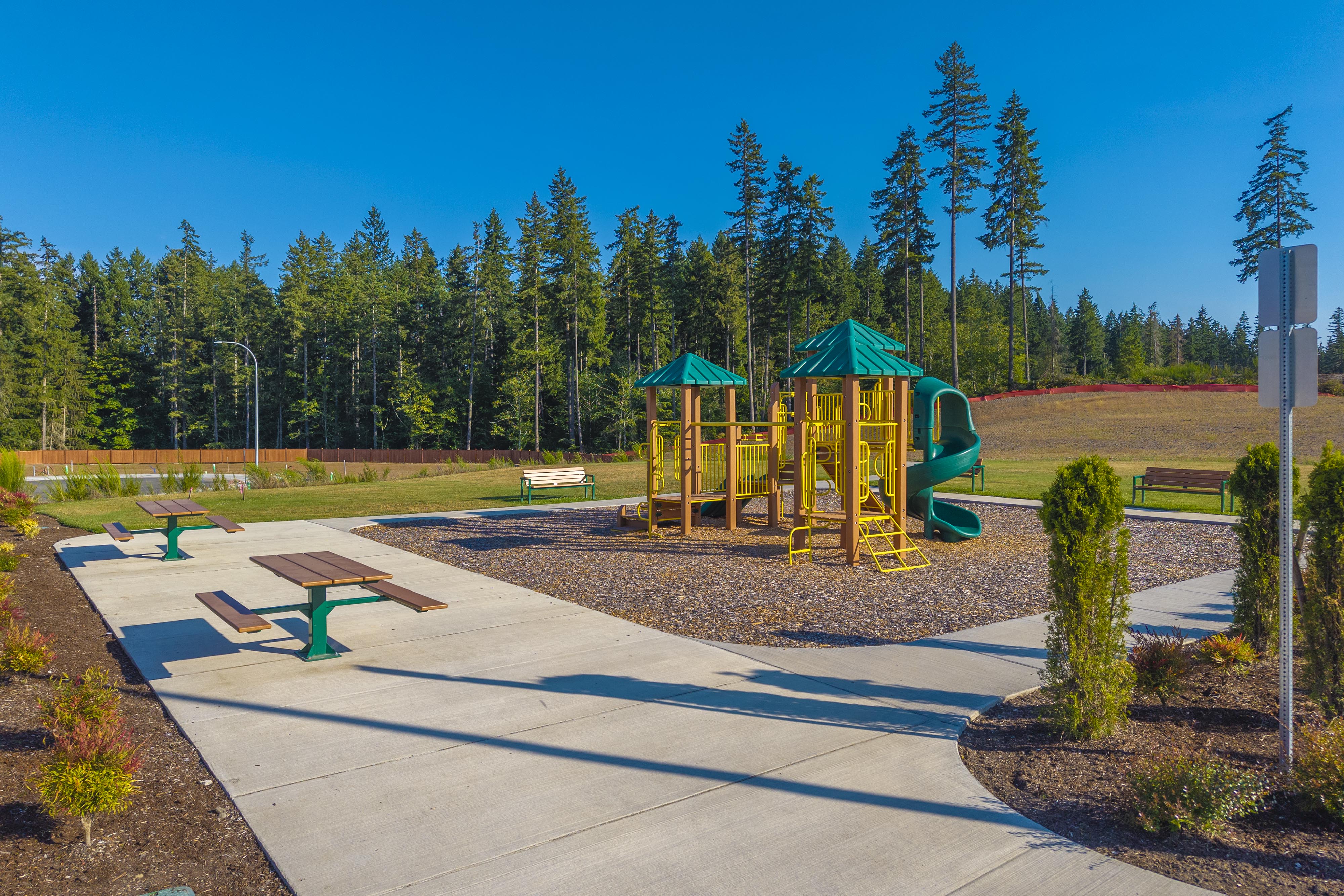 A small play structure in a park.