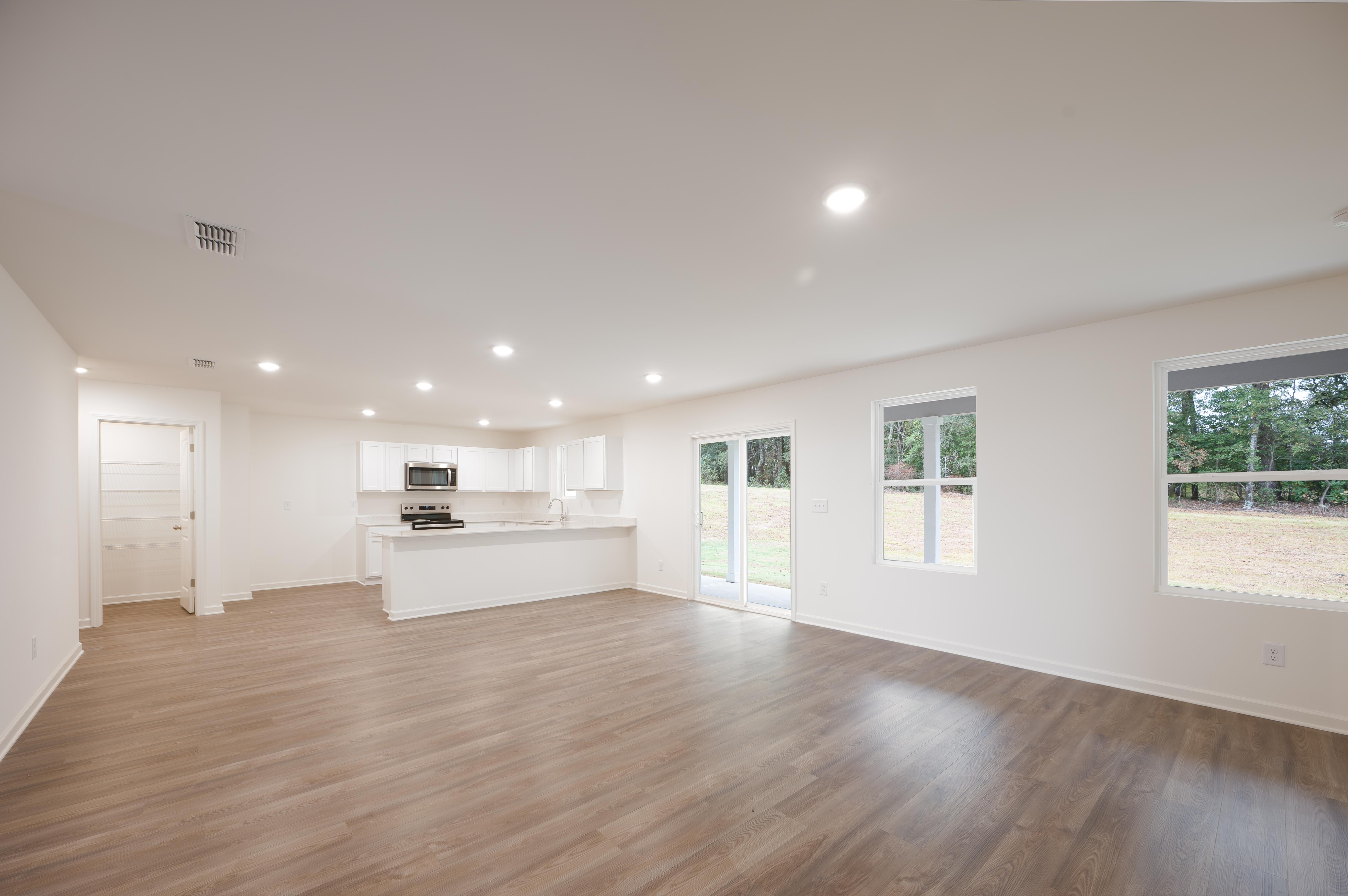 great room + kitchen - augusta - unfurnished + quartz - se arrowhead by the lake