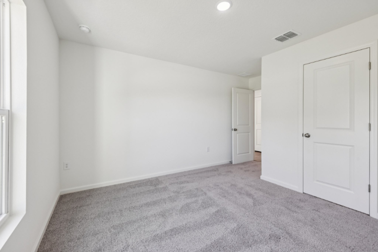 A room with white doors.