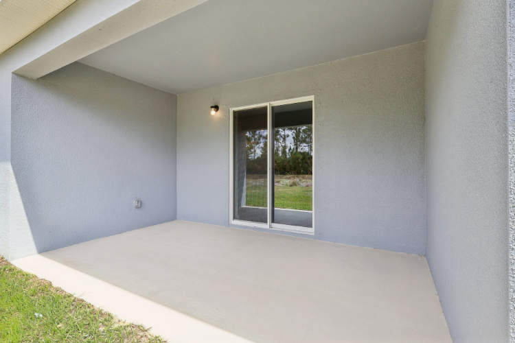A room with a window and a door.